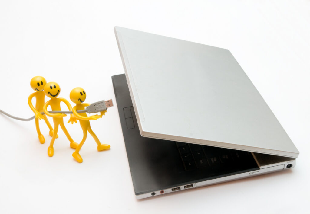 laptop and charging battery