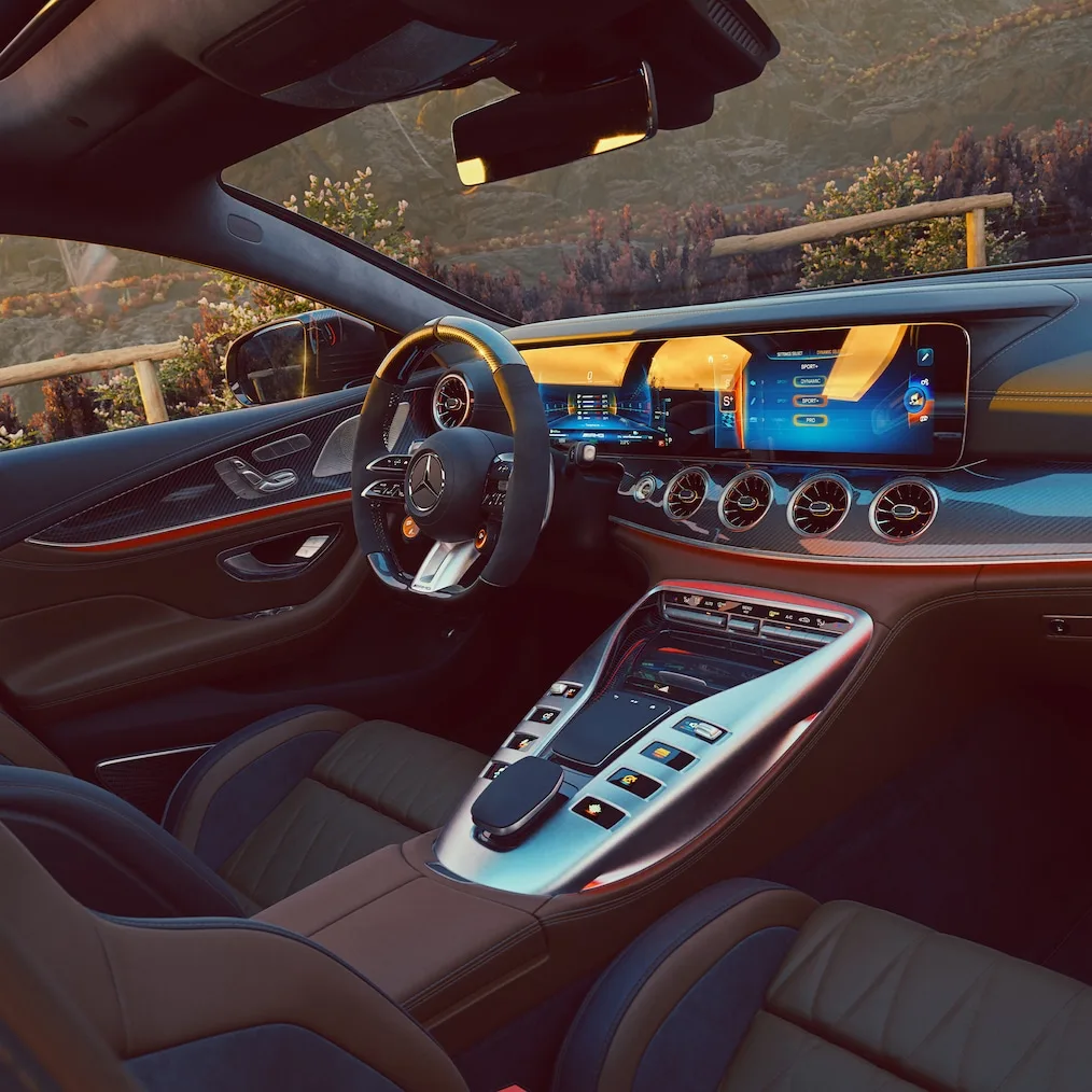 Mercedes-AMG GT63 electric sedan interior with performance displays and passenger screen