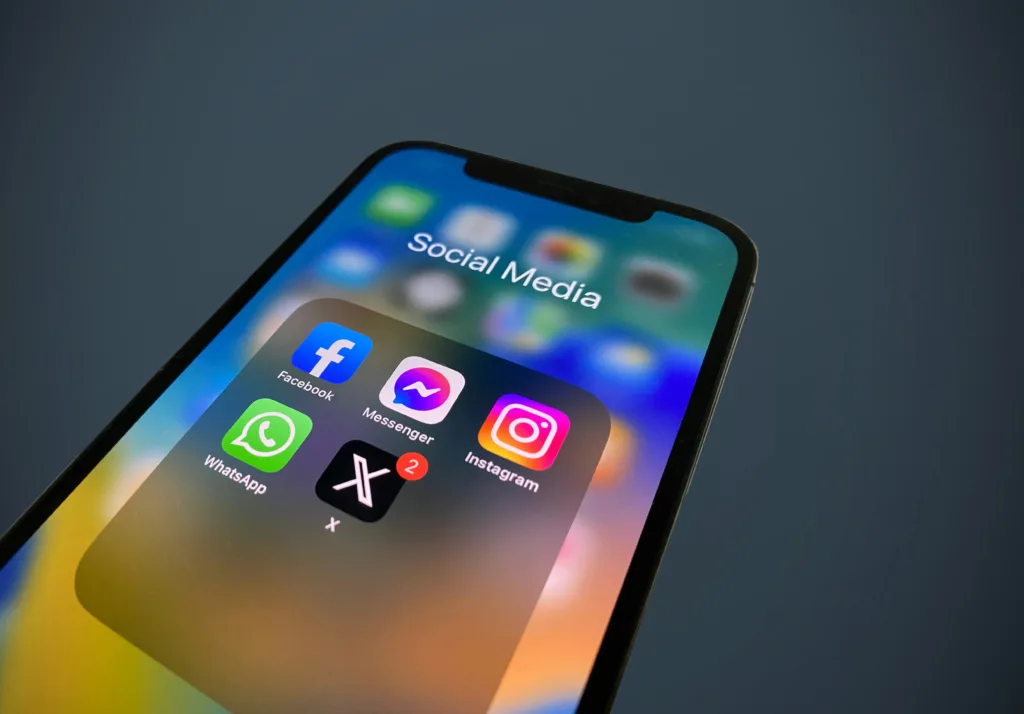 X Help Center page shows new limits for unverified accounts including 50 posts per day